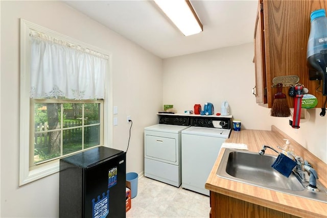 washroom featuring independent washer and dryer