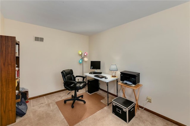 office space with carpet flooring and baseboards