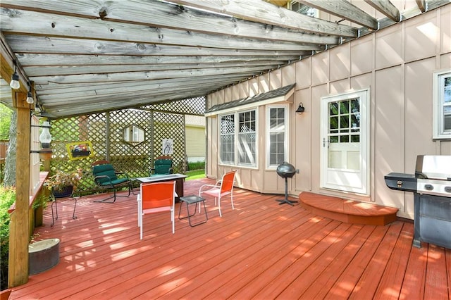 wooden terrace with grilling area