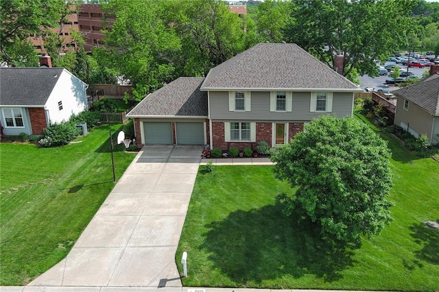 view of front of home with brick siding, a garage, concrete driveway, and a chimney
