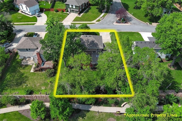 aerial perspective of suburban area with property parcel outlined