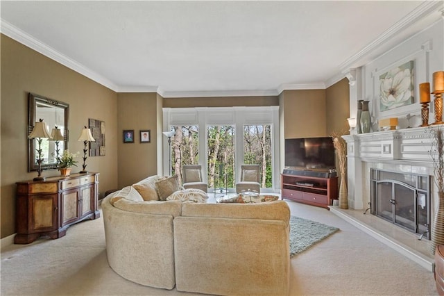 carpeted living area featuring a high end fireplace and ornamental molding