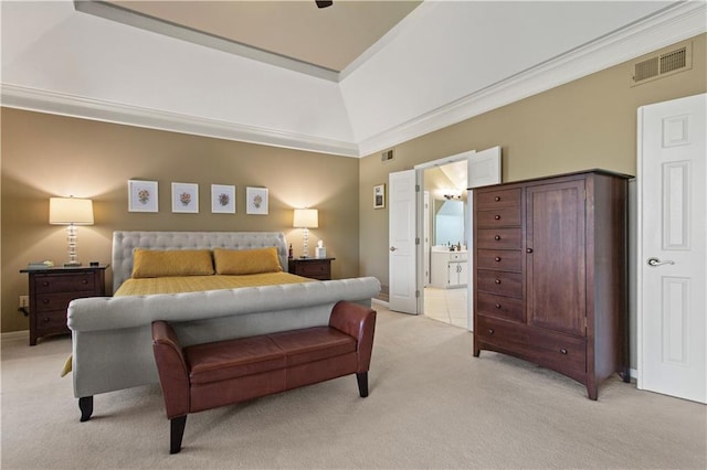 bedroom with crown molding, visible vents, light carpet, and ensuite bathroom
