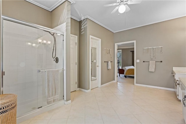 ensuite bathroom with connected bathroom, a ceiling fan, a shower stall, and ornamental molding