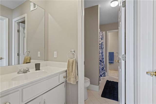 bathroom featuring vanity, toilet, tile patterned floors, a shower with curtain, and visible vents