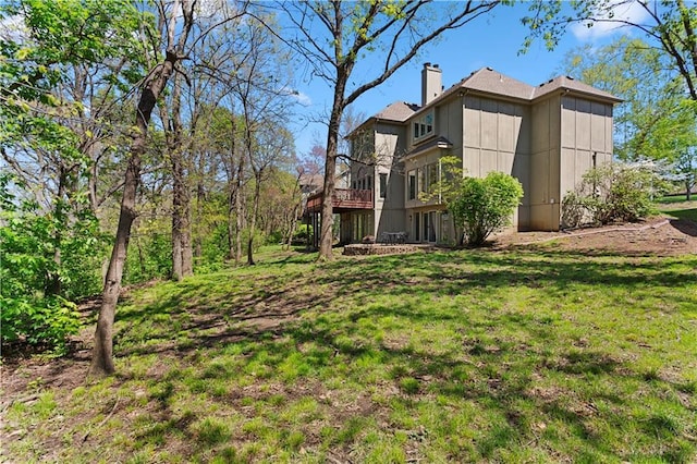 view of yard featuring a wooden deck