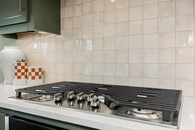 16159 S Kaw St, Olathe, KS 66062 - kitchen view of stainless steel gas stovetop, backsplash, and light countertops
