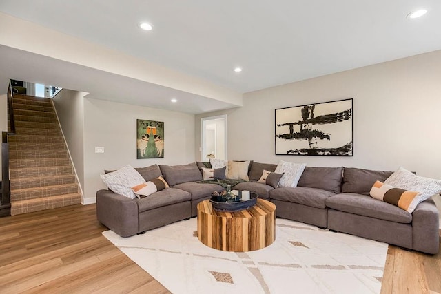 16159 S Kaw St, Olathe, KS 66062 - living area featuring stairs, light wood-type flooring, recessed lighting, and baseboards