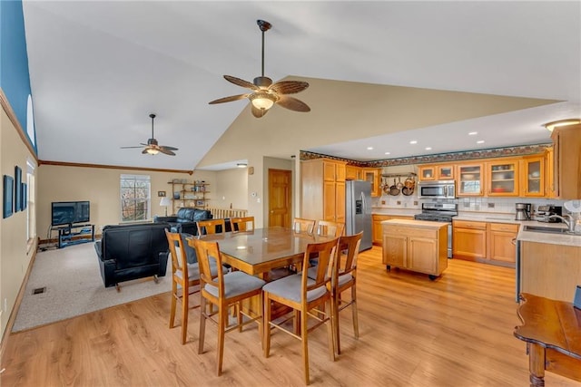 4955 Saratoga Dr, Mclouth, KS 66054 - dining area with light wood-type flooring, baseboards, recessed lighting, a ceiling fan, and high vaulted ceiling