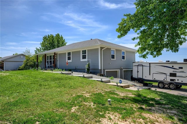 50 N 80th Pl, Kansas City, KS 66111 - view of front of home featuring an attached garage and a front yard