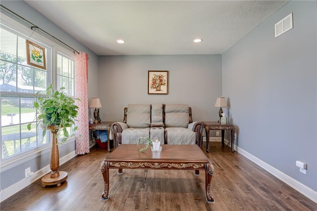 50 N 80th Pl, Kansas City, KS 66111 - living area with plenty of natural light, baseboards, wood finished floors, and recessed lighting