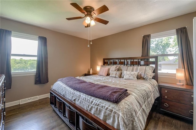 50 N 80th Pl, Kansas City, KS 66111 - bedroom featuring dark wood-style flooring, baseboards, and a ceiling fan