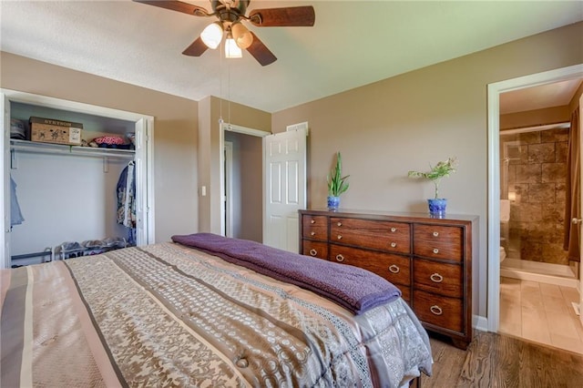 50 N 80th Pl, Kansas City, KS 66111 - bedroom with wood finished floors, a closet, ensuite bath, and ceiling fan