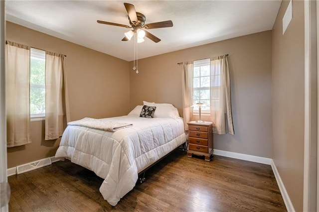 50 N 80th Pl, Kansas City, KS 66111 - bedroom featuring baseboards, dark wood-type flooring, and ceiling fan