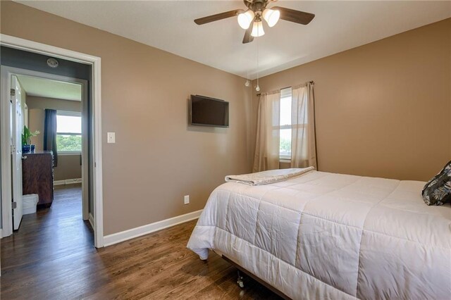 50 N 80th Pl, Kansas City, KS 66111 - bedroom featuring baseboards, wood finished floors, and a ceiling fan