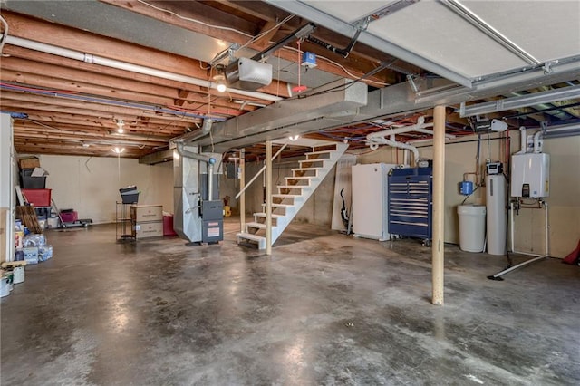 50 N 80th Pl, Kansas City, KS 66111 - unfinished basement with a water softener system, heating unit, tankless water heater, stairs, and fridge
