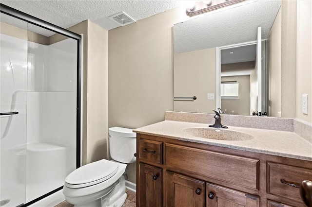 full bath with a shower stall, toilet, a textured ceiling, and visible vents