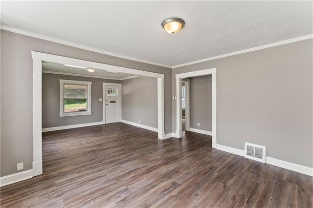 809 S Crysler Ave, Independence, MO 64052 - unfurnished room with wood finished floors, baseboards, and ornamental molding