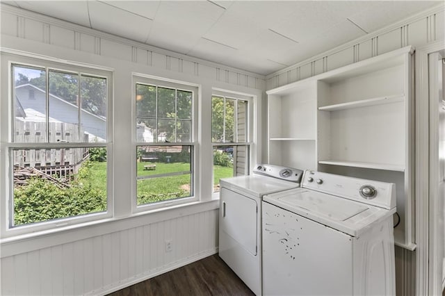 809 S Crysler Ave, Independence, MO 64052 - clothes washing area with washer and clothes dryer and dark wood-style floors