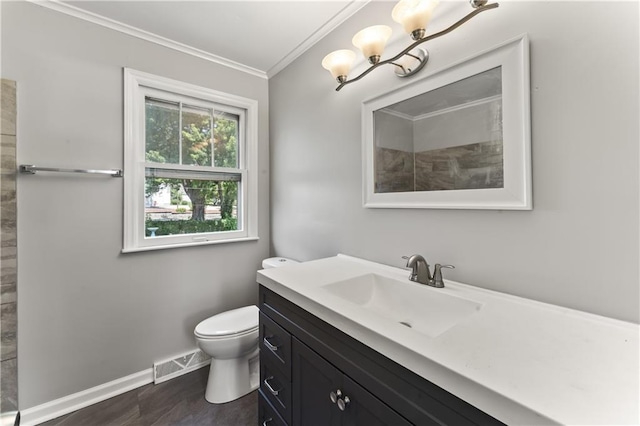 809 S Crysler Ave, Independence, MO 64052 - bathroom with ornamental molding, baseboards, toilet, a chandelier, and vanity