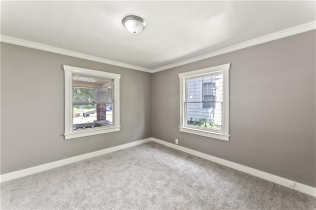 809 S Crysler Ave, Independence, MO 64052 - carpeted spare room with crown molding and baseboards