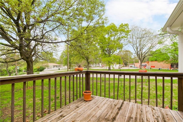 deck featuring a lawn