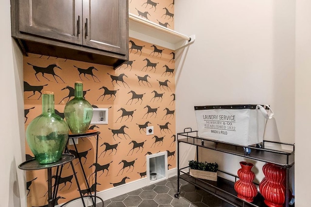 15286 W 161st St, Olathe, KS 66062 - washroom with cabinet space, washer hookup, and dark tile patterned flooring