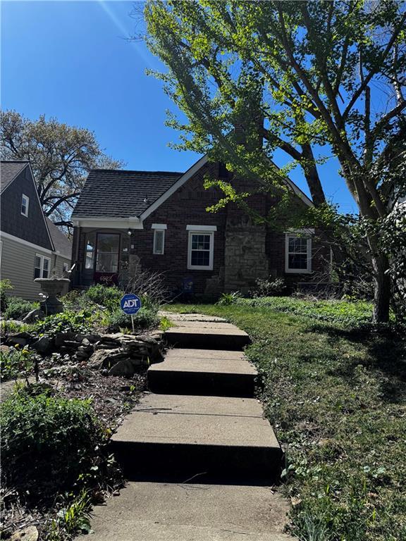 view of front of house featuring stone siding