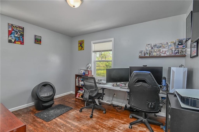 office featuring baseboards and wood finished floors