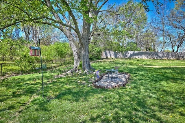 view of yard with fence