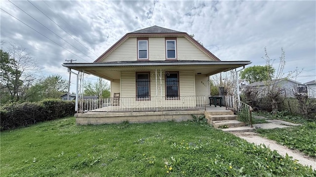 2901 Farrow Ave, Kansas City, KS 66104 - view of front facade with a front lawn and covered porch