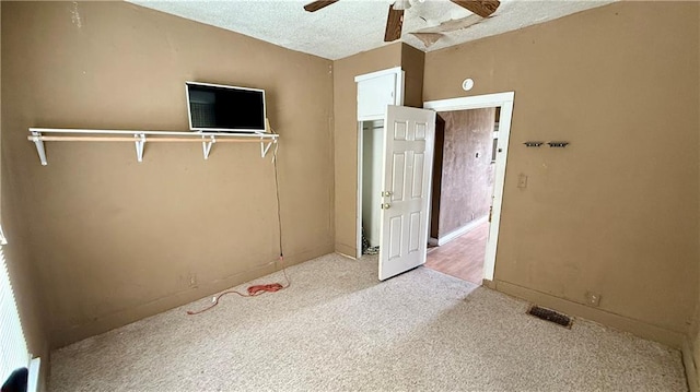 2901 Farrow Ave, Kansas City, KS 66104 - unfurnished bedroom with carpet floors, ceiling fan, visible vents, and baseboards
