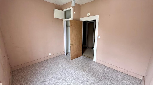 2901 Farrow Ave, Kansas City, KS 66104 - unfurnished bedroom featuring baseboards and carpet floors