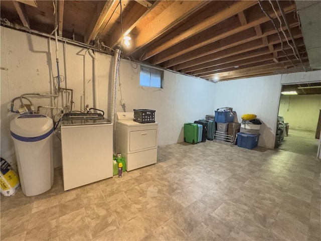 below grade area featuring washer and dryer
