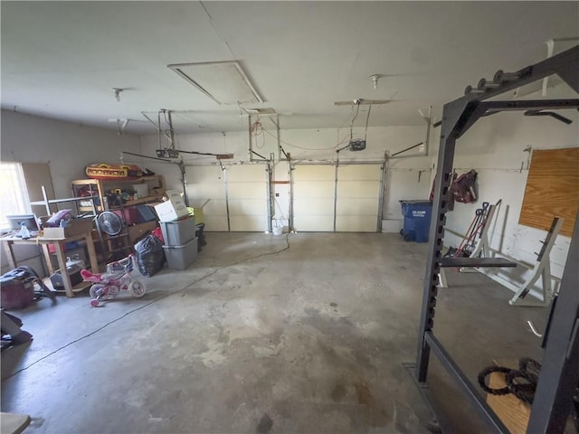 garage featuring a garage door opener