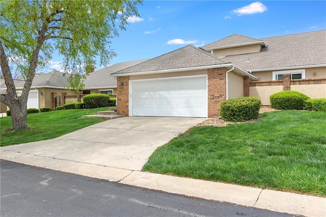 9738 Nieman Pl, Overland Park, KS 66214 - view of front facade featuring fence, an attached garage, brick siding, a front yard, and concrete driveway