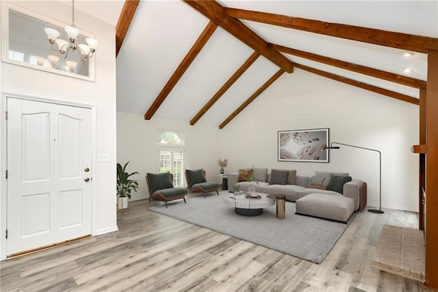 9738 Nieman Pl, Overland Park, KS 66214 - living area with beam ceiling, high vaulted ceiling, baseboards, a notable chandelier, and light wood-style floors