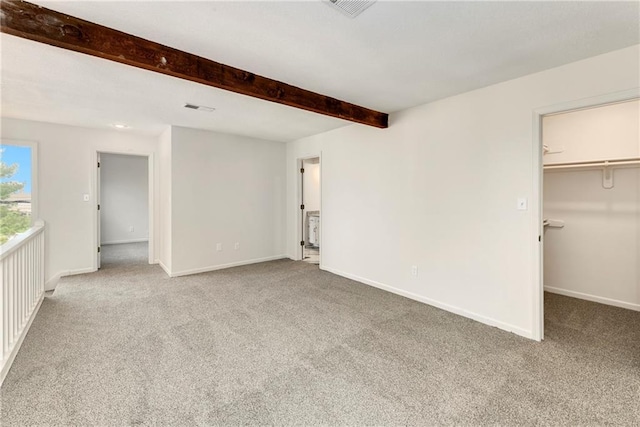 9738 Nieman Pl, Overland Park, KS 66214 - interior space with baseboards, carpet flooring, beam ceiling, and visible vents