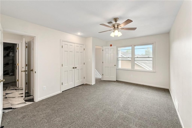 9738 Nieman Pl, Overland Park, KS 66214 - unfurnished bedroom featuring carpet floors, a ceiling fan, baseboards, and a closet