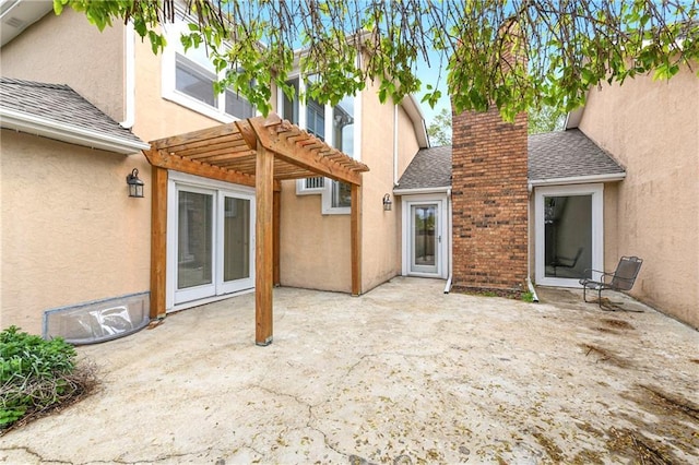 9738 Nieman Pl, Overland Park, KS 66214 - back of house featuring a chimney, roof with shingles, a patio area, a pergola, and stucco siding