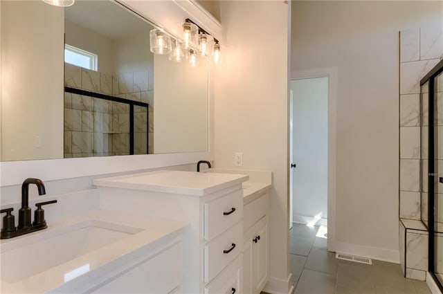 1308 N Holland Dr, Independence, MO 64056 - bathroom with a shower stall, vanity, and tile patterned floors