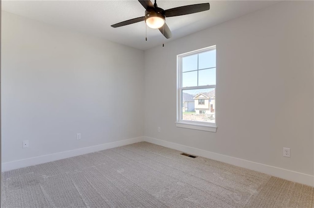 1308 N Holland Dr, Independence, MO 64056 - carpeted empty room featuring baseboards and ceiling fan
