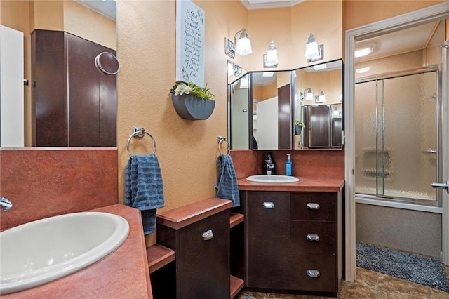5101 NW Downing St, Blue Springs, MO 64015 - full bathroom featuring vanity, ornamental molding, and a textured wall