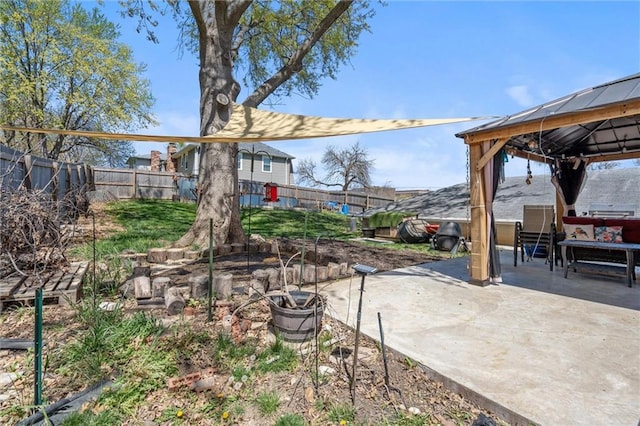 5101 NW Downing St, Blue Springs, MO 64015 - fenced backyard with a gazebo and a patio area