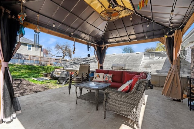 5101 NW Downing St, Blue Springs, MO 64015 - fenced backyard featuring an outdoor hangout area, a patio, and a gazebo