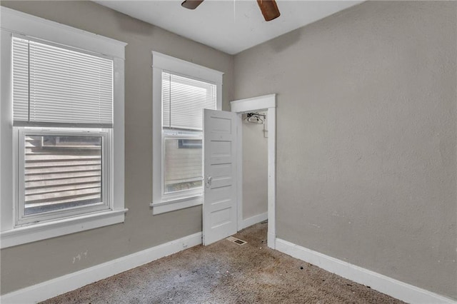 442 N Colorado Ave, Kansas City, MO 64123 - carpeted empty room with baseboards and ceiling fan