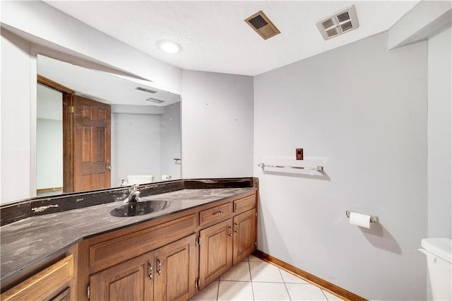 1707 NW Ashton Dr, Blue Springs, MO 64015 - half bath with tile patterned floors, vanity, visible vents, and toilet