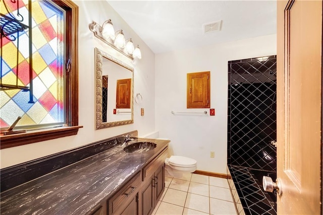 1707 NW Ashton Dr, Blue Springs, MO 64015 - bathroom featuring vanity, baseboards, tile patterned floors, toilet, and visible vents