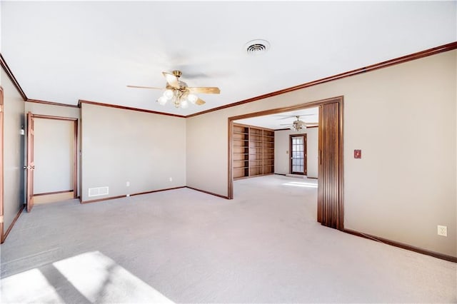 1707 NW Ashton Dr, Blue Springs, MO 64015 - spare room with light carpet, baseboards, a ceiling fan, and visible vents