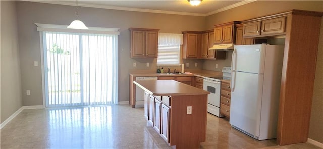 1219 S 3rd St, Louisburg, KS 66053 - kitchen featuring white appliances, under cabinet range hood, a kitchen island, light countertops, and pendant lighting